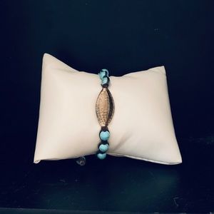 Brown leather woven bracelet with turquoise